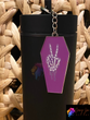 Neon Purple Skellie Peace Coffin Keychain